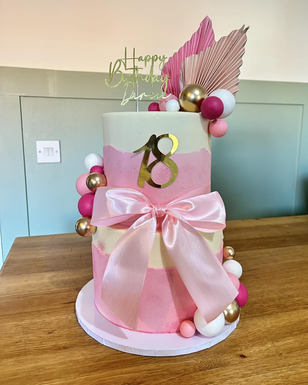 Pink bow eighteenth birthday cake